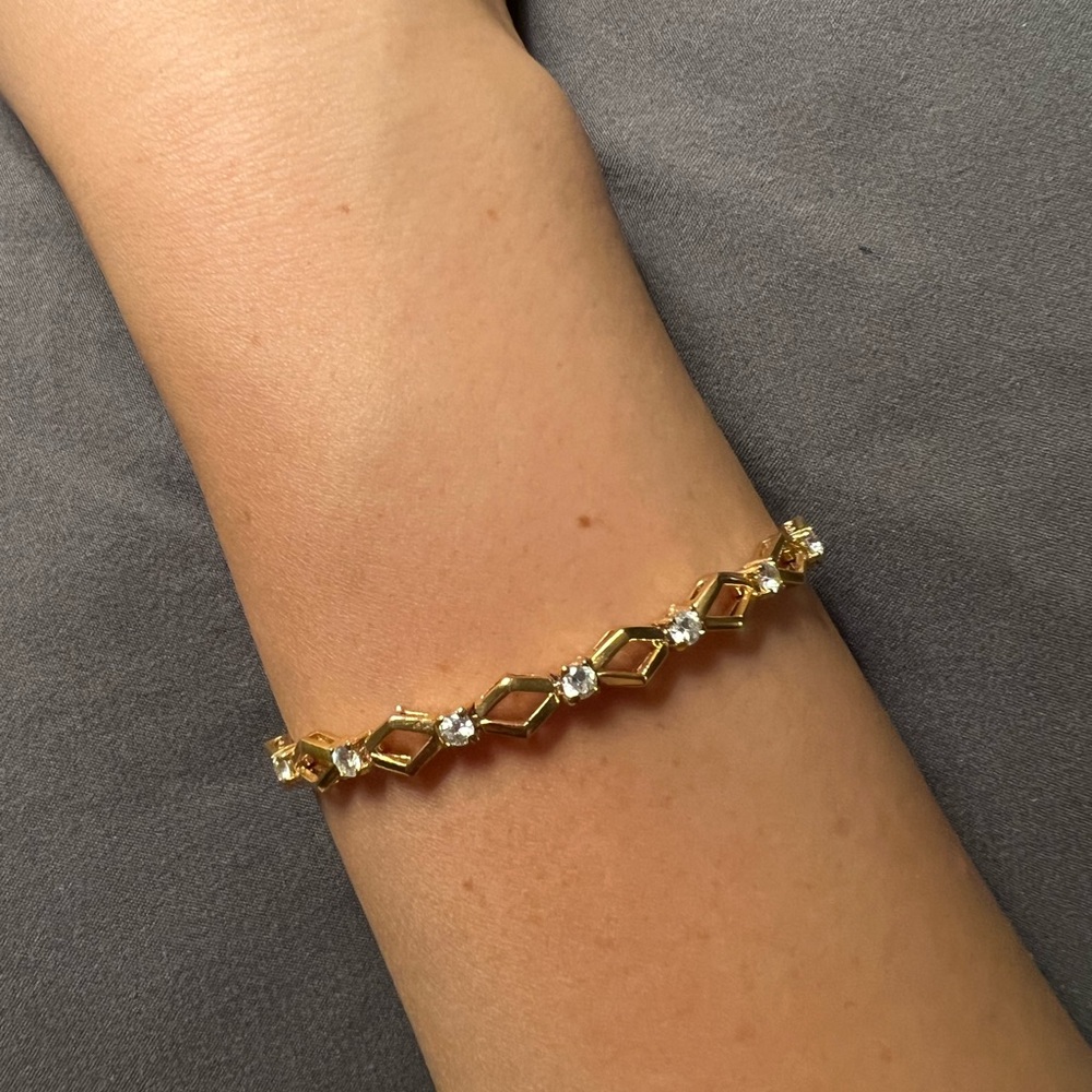 Gold bracelet with faux diamonds